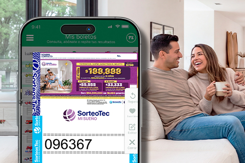 Pareja celebrando frente al celular al ganar el Sorteo Mi Sueño de Sorteos Tec.